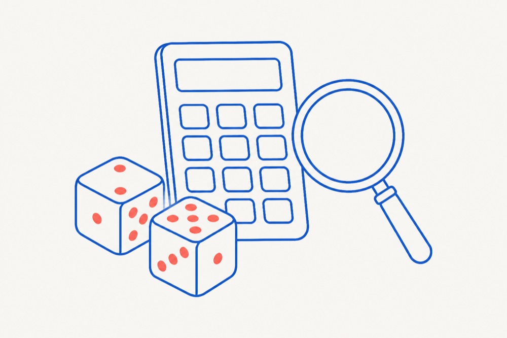 A pocket calculator, two dice and a magnifying glass arranged on a flat surface